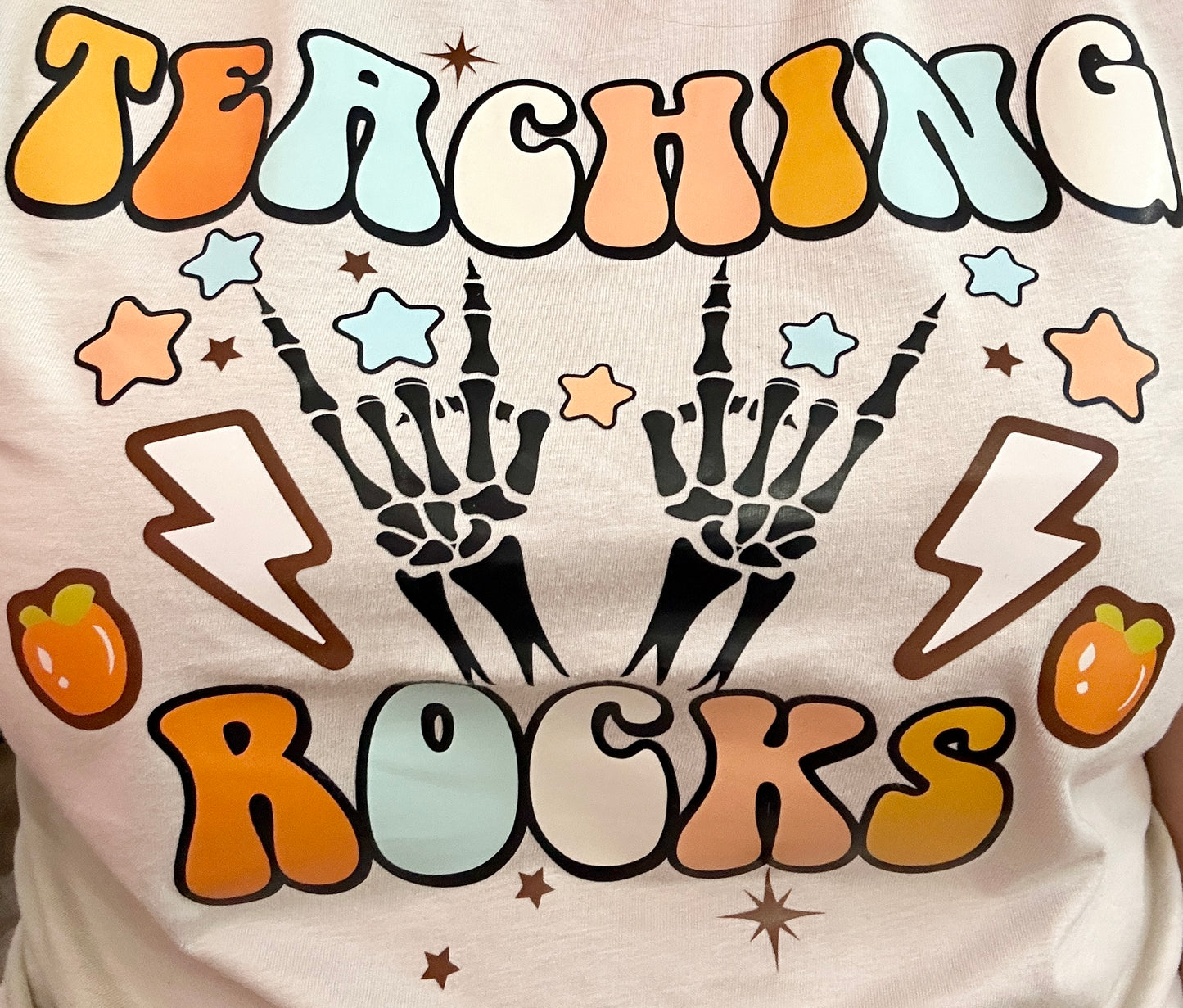 Teaching Rocks • Tee